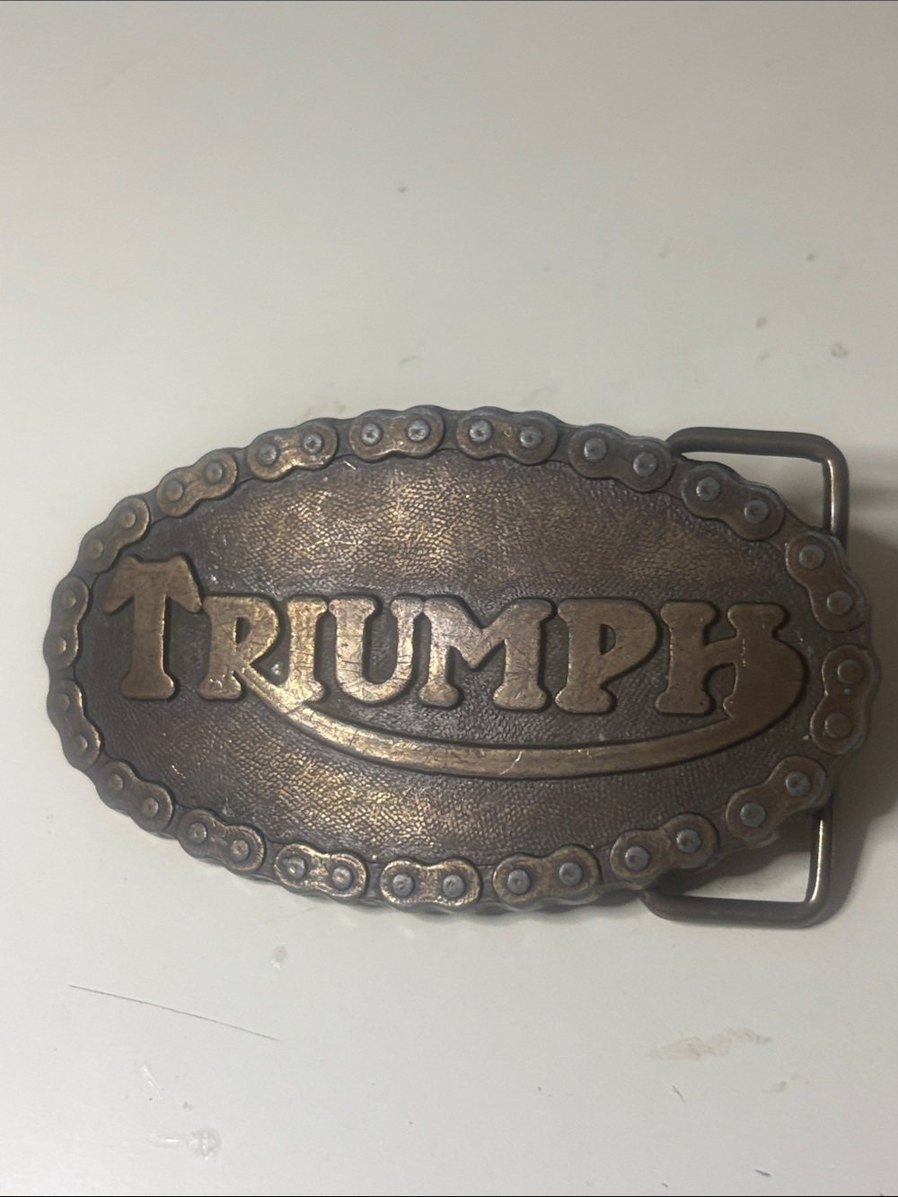 Triumph Oval Embossed Belt Buckle - Brown/Antique Brass - 3.5x2 in